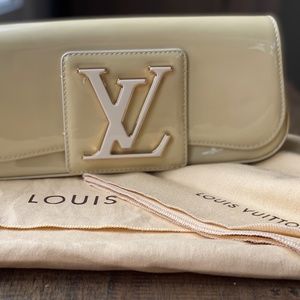 Louis Vuitton Sobe Clutch
